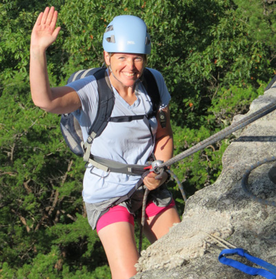 woman rock climbing